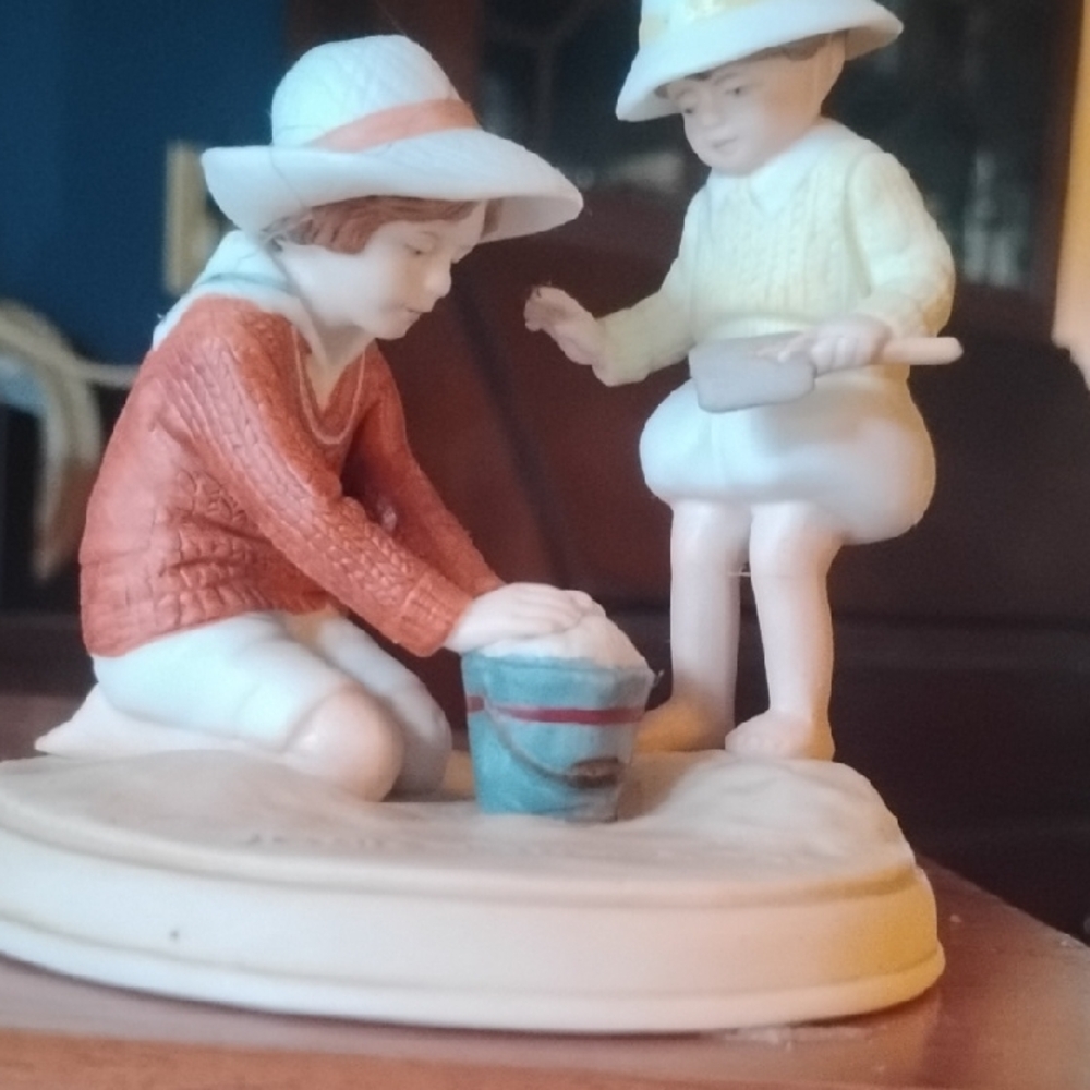 Charming Figurine of Children Playing